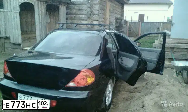 Фото автомобиля KIA SPECTRA, 2008 — госномер Н433КТ159. Цвет: Черный жемчуг (Чёрный)