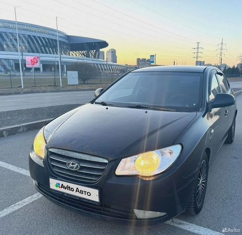 Фото автомобиля HYUNDAI ELANTRA, 2006 — госномер Е389РА53. Цвет: ЧЕРНЫЙ