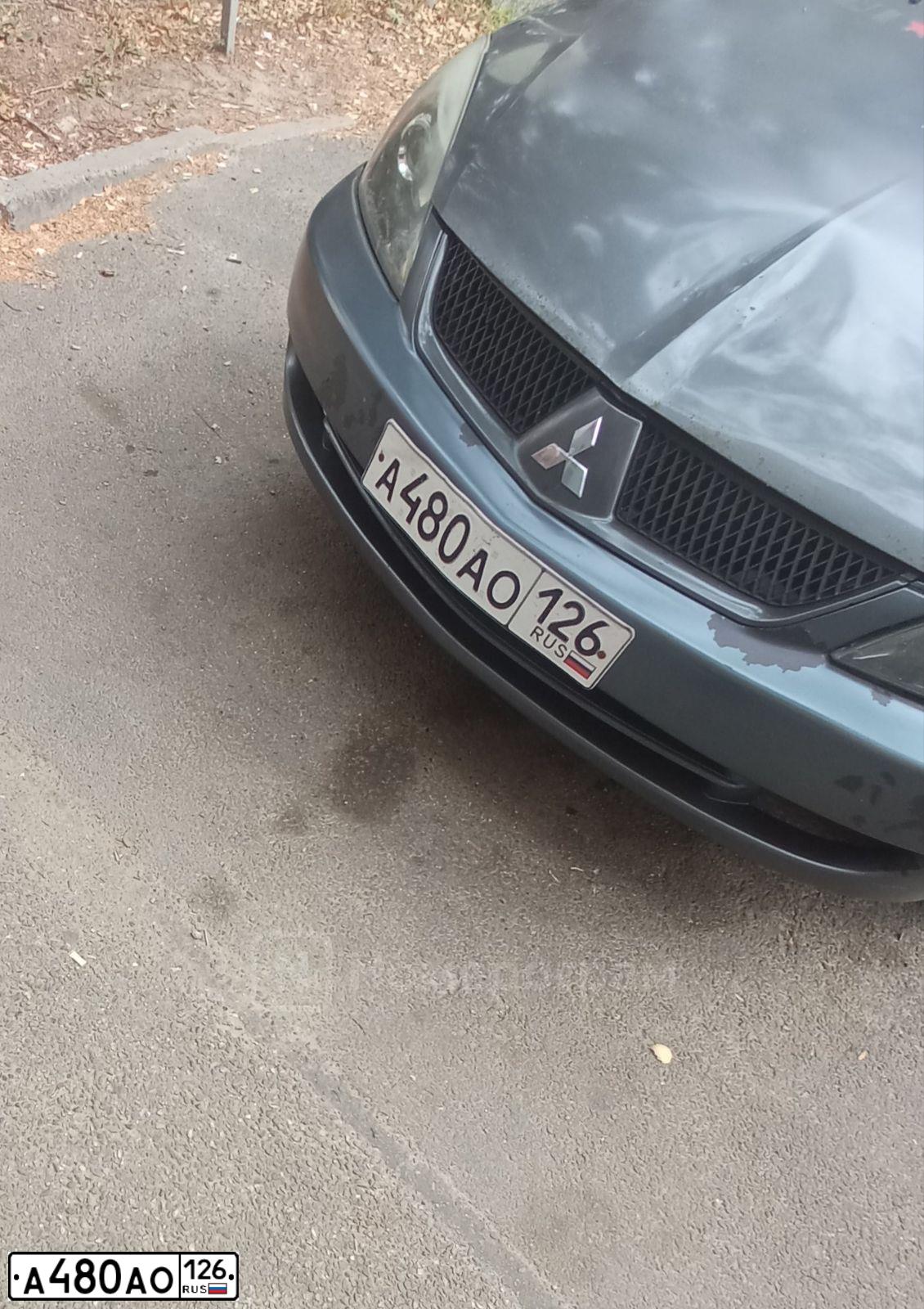Фото автомобиля MITSUBISHI LANCER, 2006 — госномер М071МТ177. Цвет: СЕРЫЙ