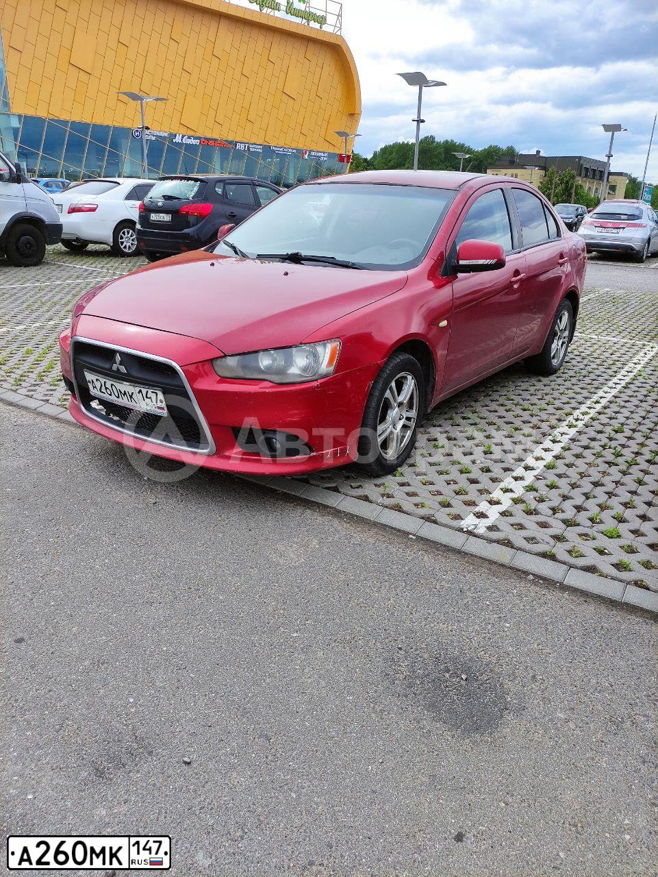 Фото автомобиля MITSUBISHI LANCER, 2007 — госномер А260МК147. Цвет: Красный
