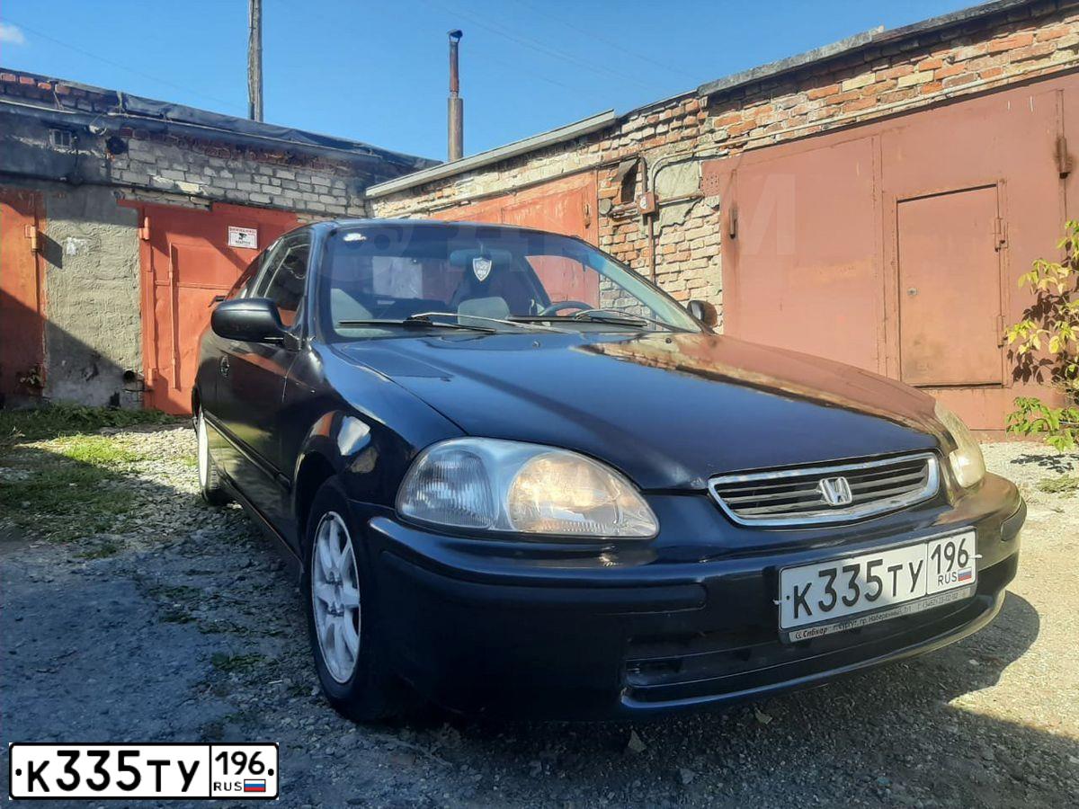 Фото автомобиля HONDA CIVIC, 1997 — госномер К335ТУ196. Цвет: ЧЕРНЫЙ