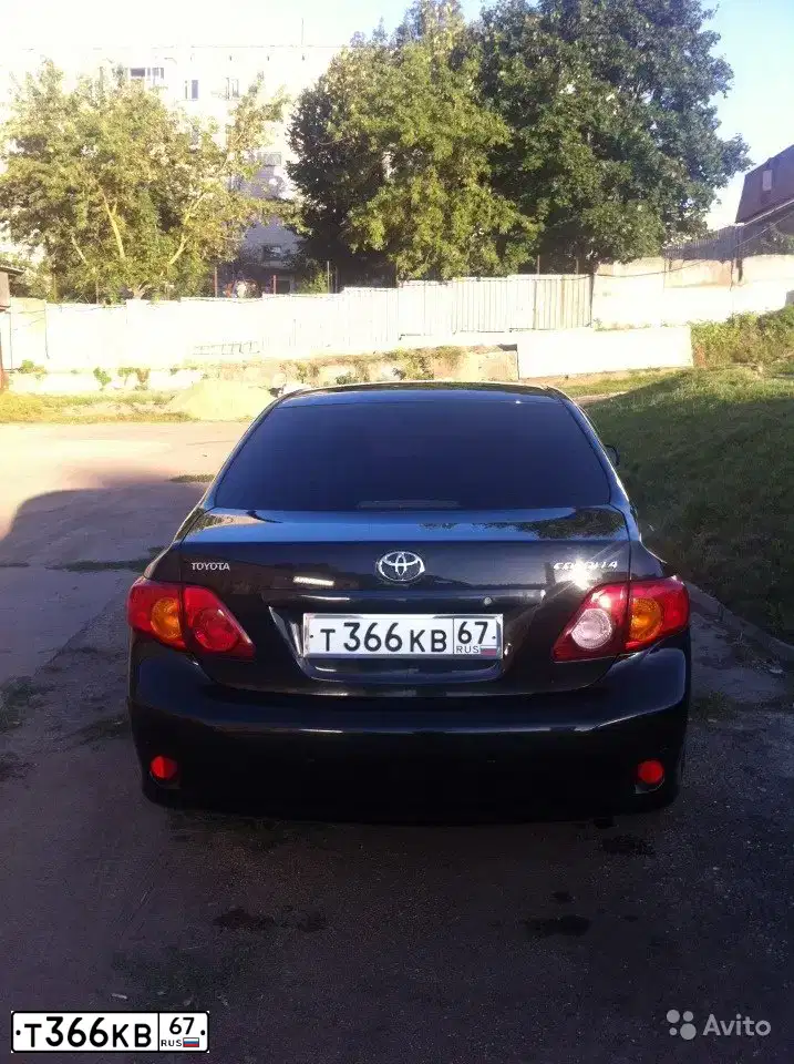Фото автомобиля TOYOTA COROLLA, 2008 — госномер М021ЕТ716. Цвет: ЧЕРНЫЙ