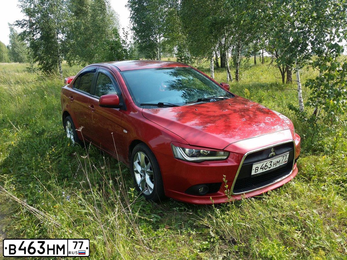 Фото автомобиля MITSUBISHI LANCER, 2008 — госномер У540МР72. Цвет: КРАСНЫЙ