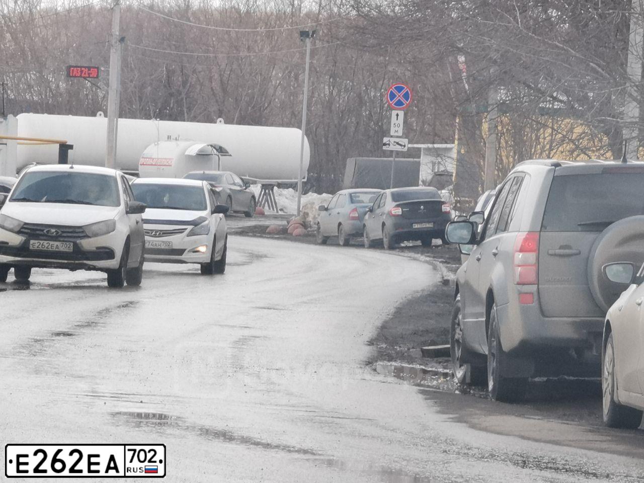 Фото автомобиля LADA 2190 GRANTA, 2020 — госномер Е262ЕА702. Цвет: Белый