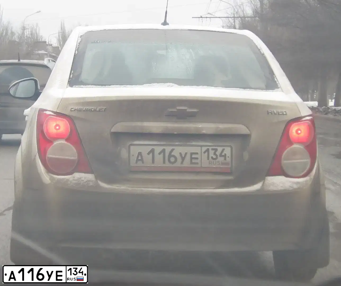 Фото автомобиля CHEVROLET AVEO, 2013 — госномер А116УЕ134. Цвет: БЕЛЫЙ