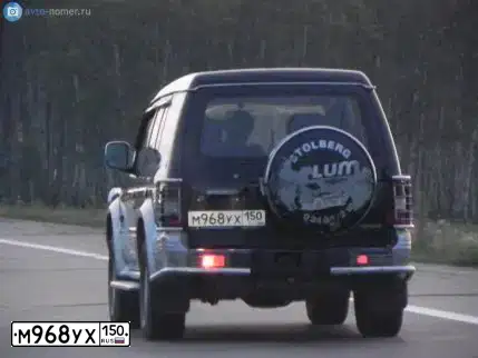 Фото автомобиля MITSUBISHI PAJERO, 1996 — госномер Е918РС702. Цвет: синий