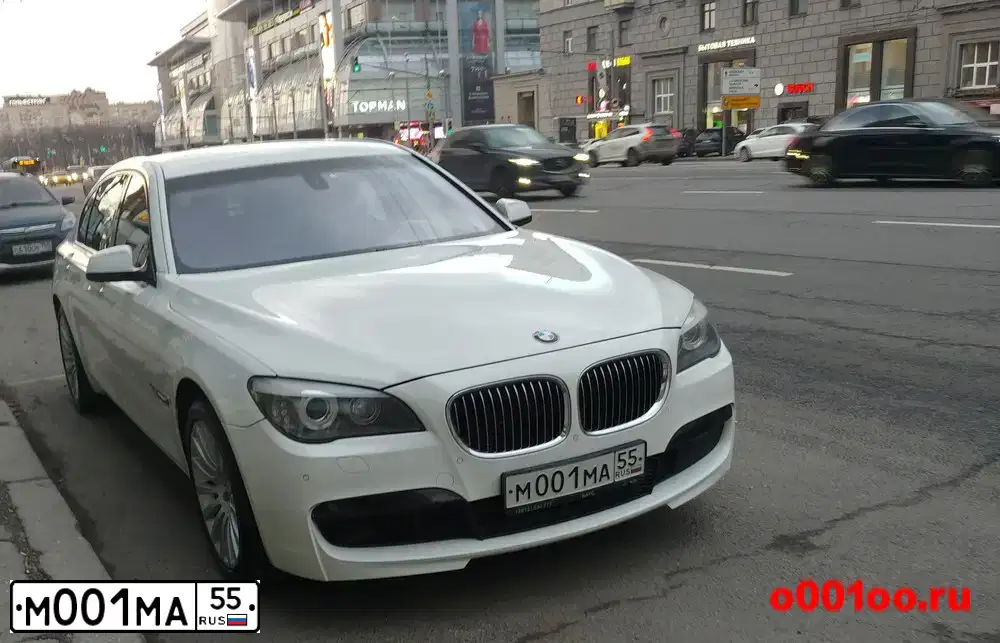 Фото автомобиля BMW SERIE 7, 2011 — госномер М001МА55. Цвет: БЕЛЫЙ