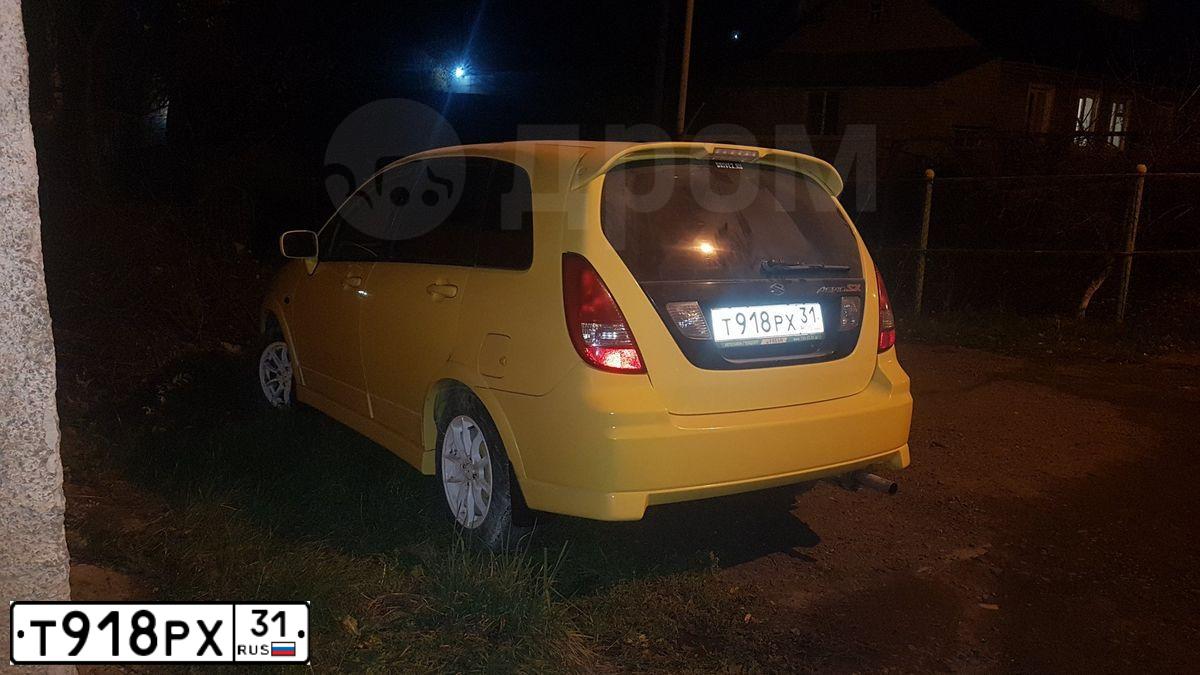 Фото автомобиля SUZUKI AERIO, 2002 — госномер Е271АС977