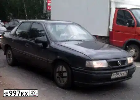 Фото автомобиля OPEL VECTRA, 1993 — госномер К997КХ29. Цвет: ЧЕРНО-СИНИЙ