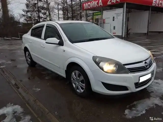 Фото автомобиля OPEL ASTRA, 2007 — госномер Н326ТУ62. Цвет: Белый