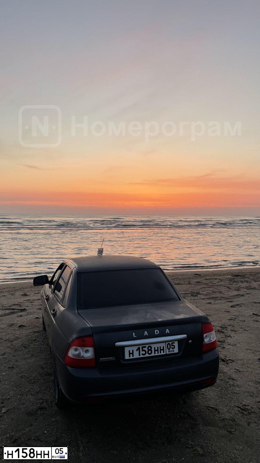 Фото автомобиля LADA 2170 PRIORA, 2014 — госномер Н158НН05. Цвет: серебристо-темно-серый