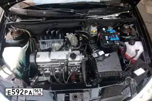 Фото автомобиля LADA 1119 KALINA, 2012 — госномер О151УР31. Цвет: Сине-Черный
