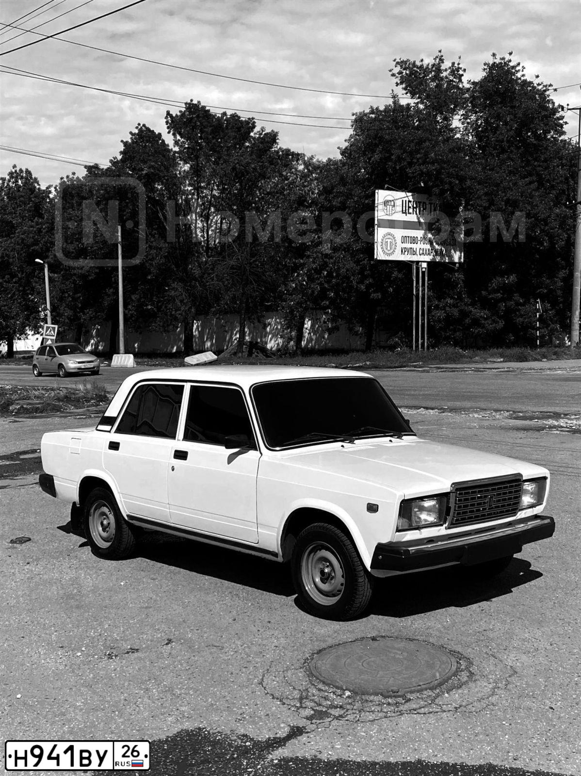 Фото автомобиля LADA 2107, 2004 — госномер Н941ВУ26. Цвет: ЯРКО-БЕЛЫЙ