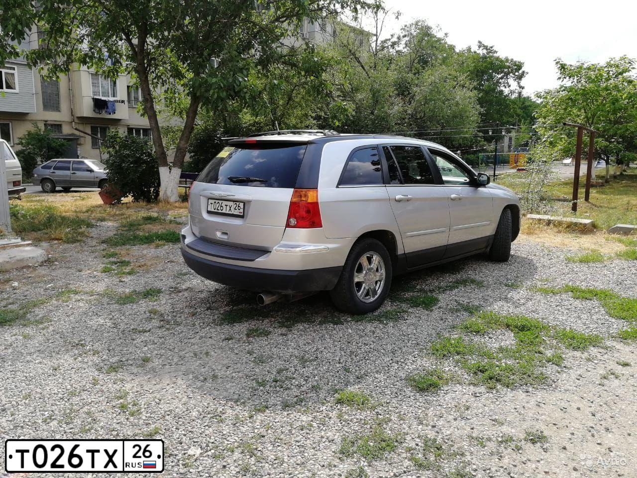 Фото автомобиля CHRYSLER PACIFICA, 2004 — госномер Е494КА126. Цвет: БЕЛЫЙ (СЕРЕБРИСТЫЙ)