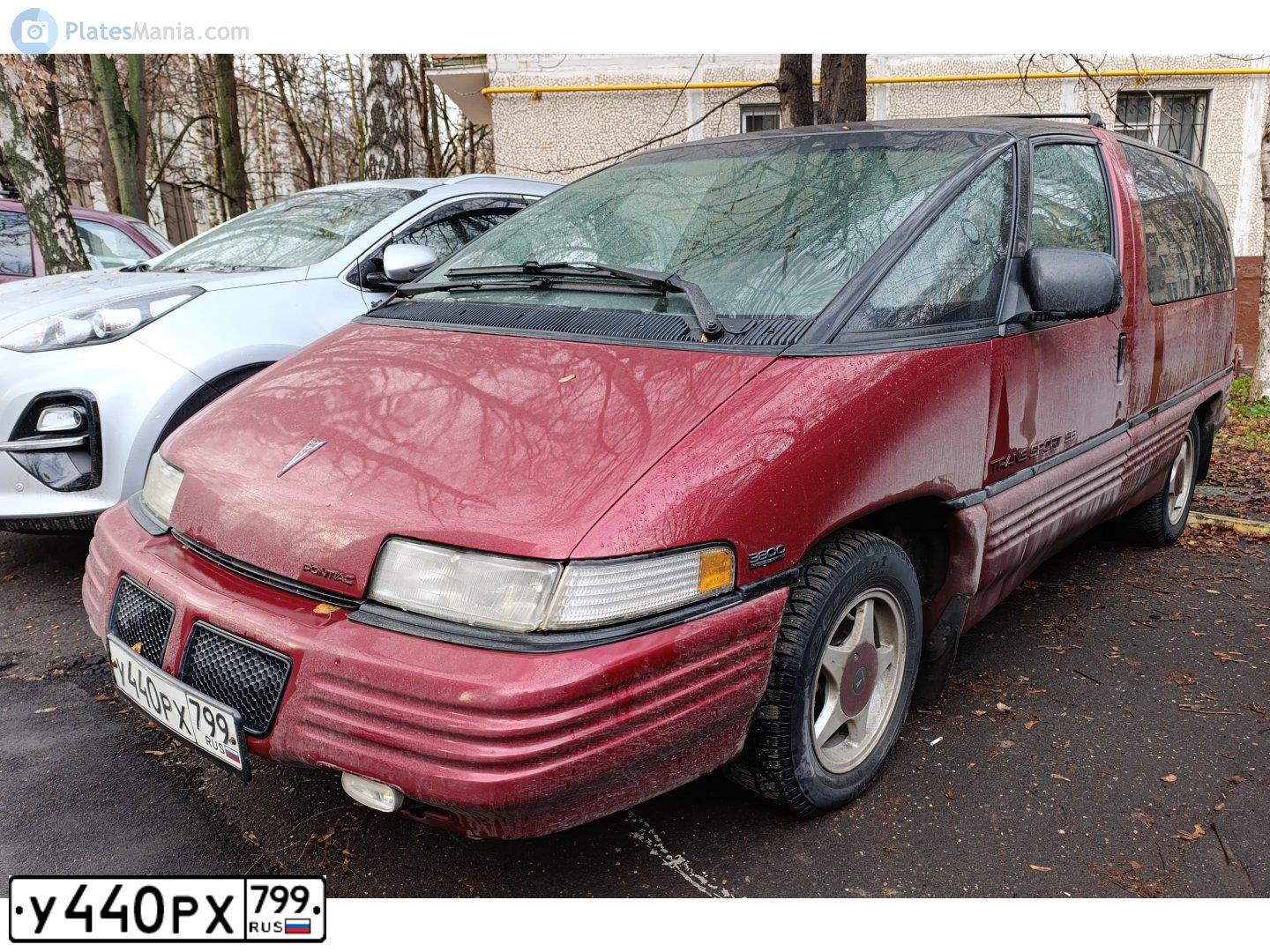 Фото автомобиля CHEVROLET TRANS SPORT, 1993 — госномер Н105ОР150. Цвет: Красный