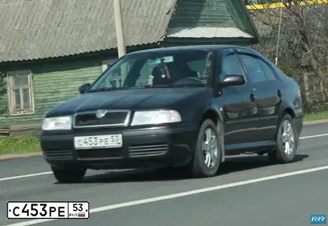 Фото автомобиля SKODA OCTAVIA, 2007 — госномер С453РЕ53. Цвет: ЧЕРНЫЙ