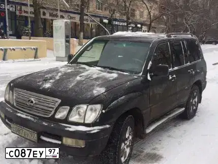 Фото автомобиля LEXUS LX, 1999 — госномер Т980ОО777. Цвет: ЧЕРНЫЙ