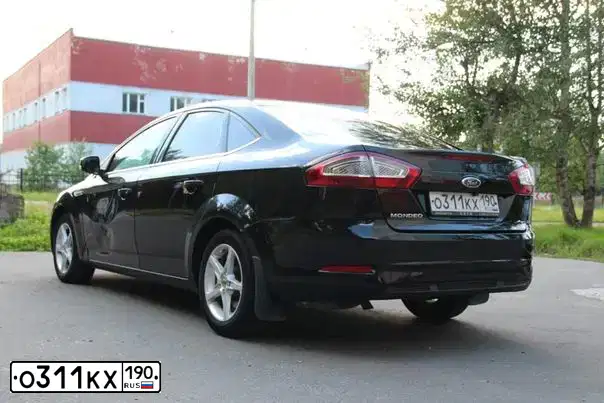 Фото автомобиля FORD MONDEO, 2010 — госномер Т717НЕ790. Цвет: ЧЕРНЫЙ