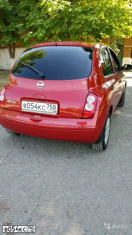 Фото автомобиля NISSAN MICRA, 2006 — госномер Н446ТО161. Цвет: Красный