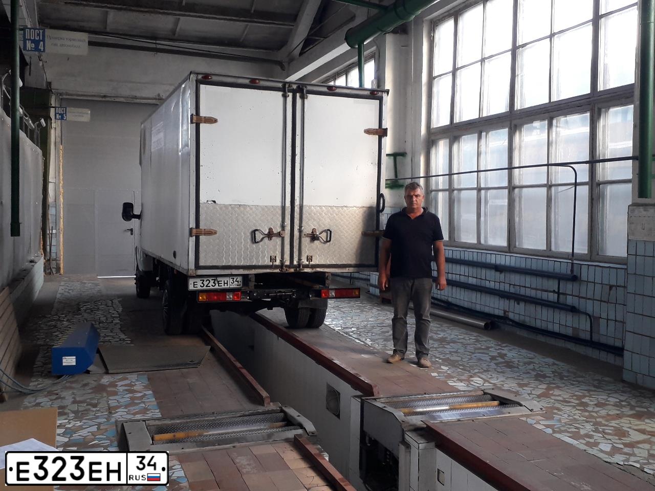 Фото автомобиля GAZ 3302 EL, 2002 — госномер Е323ЕН34. Цвет: Белый