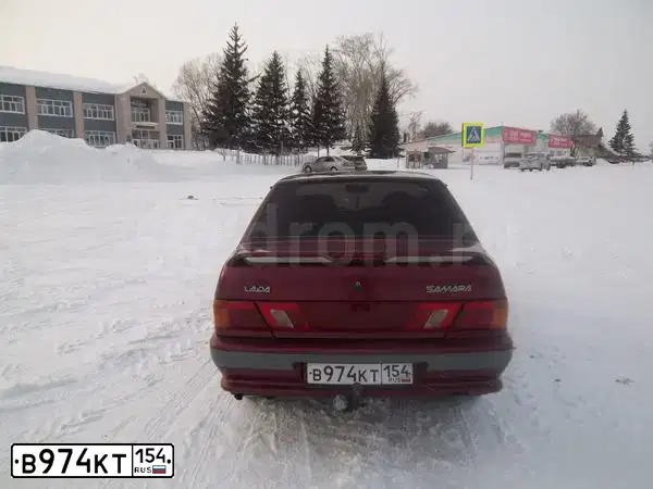Фото автомобиля LADA 2115 SAMARA, 2004 — госномер Е145УЕ154. Цвет: МАЛИНОВЫЙ