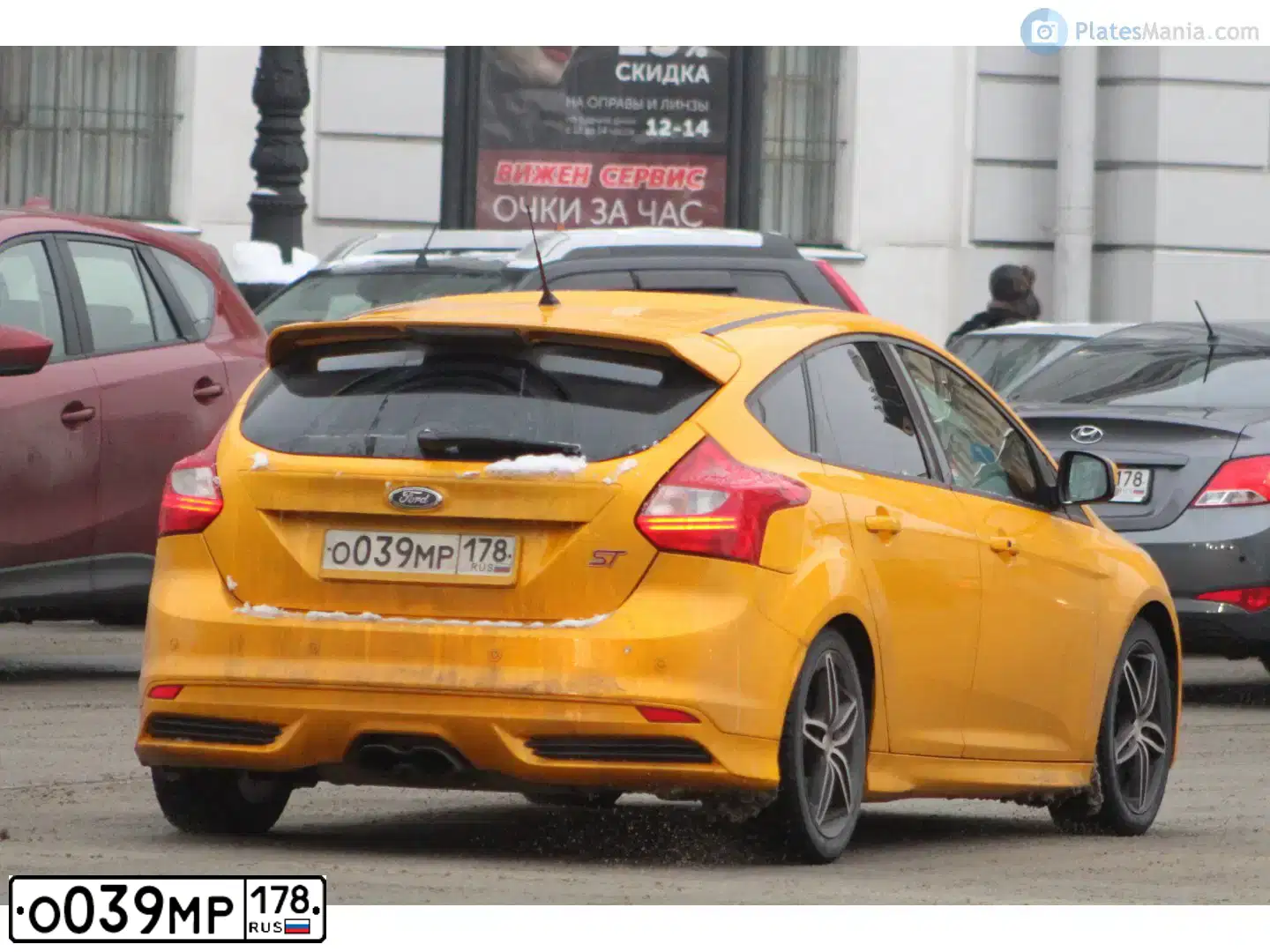 Фото автомобиля FORD FOCUS, 2012 — госномер О039МР178. Цвет: желто-оранжевый