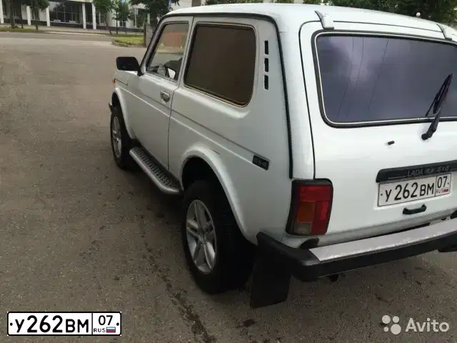Фото автомобиля LADA 2121 NIVA, 2009 — госномер У262ВМ07. Цвет: ЯРКО-БЕЛЫЙ