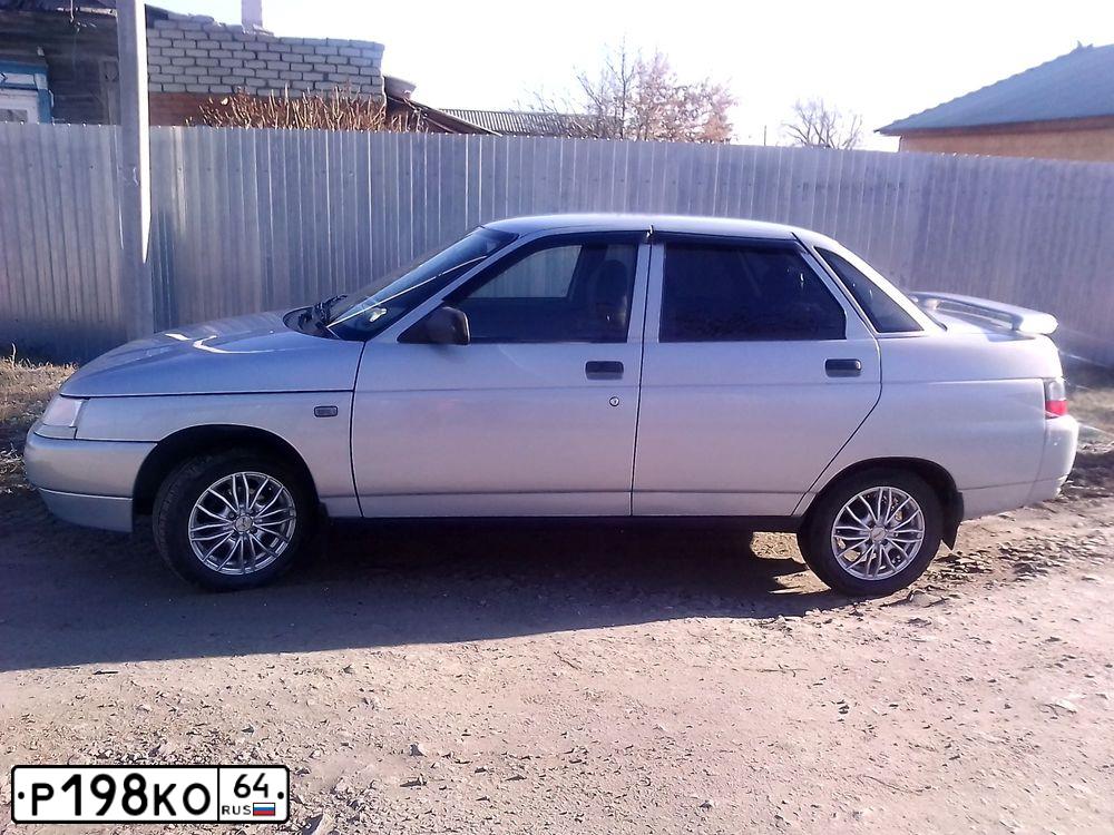 Фото автомобиля LADA 2110, 1998 — госномер Р198КО64. Цвет: БЕЛЫЙ