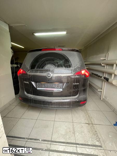 Фото автомобиля OPEL ZAFIRA, 2013 — госномер Р644НК03. Цвет: Коричневый