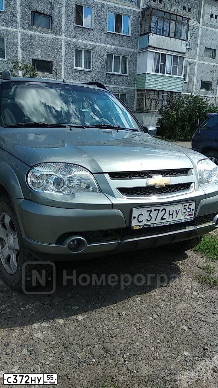 Фото автомобиля CHEVROLET NIVA, 2012 — госномер С372НУ55. Цвет: ТЕМНО-СЕРЫЙ МЕТАЛЛИК