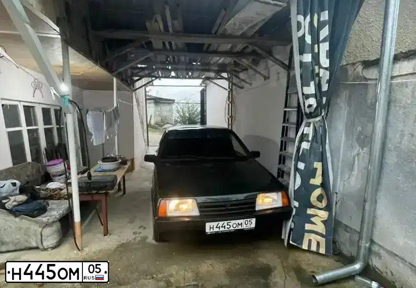 Фото автомобиля LADA 2109 SAMARA, 2002 — госномер Н445ОМ05. Цвет: ТЕМНО-ЗЕЛЕНЫЙ