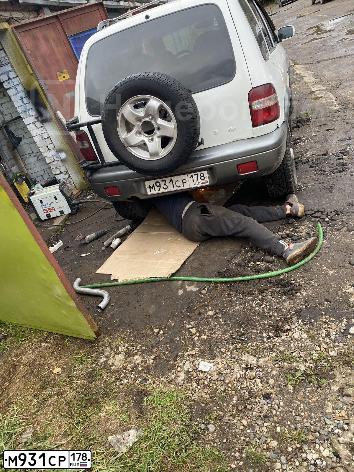 Фото автомобиля KIA SPORTAGE, 2002 — госномер М931СР178. Цвет: БЕЛЫЙ