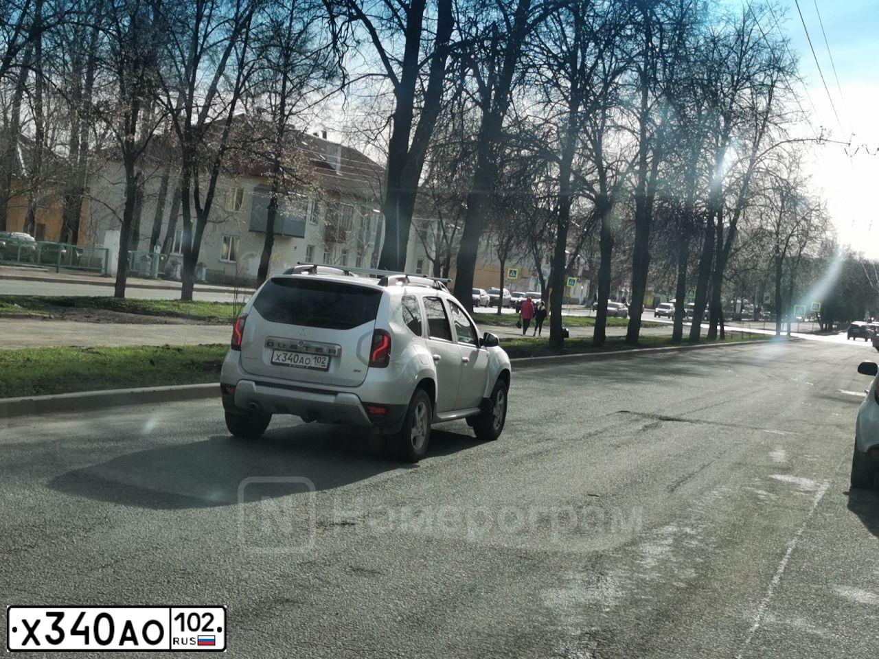Фото автомобиля LADA 2190 GRANTA, 2012 — госномер О446ТЕ72. Цвет: Серебристый