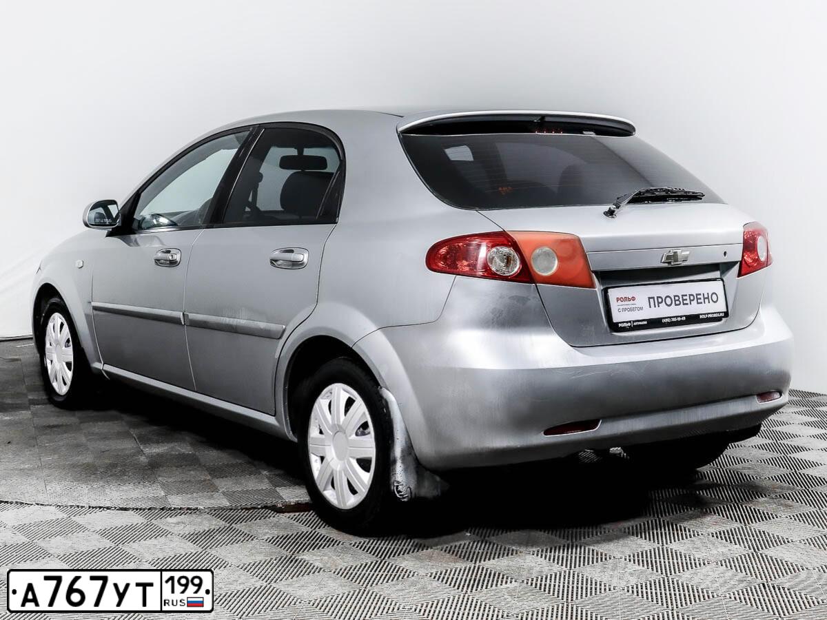 Фото автомобиля CHEVROLET LACETTI, 2009 — госномер А767УТ199. Цвет: Серый