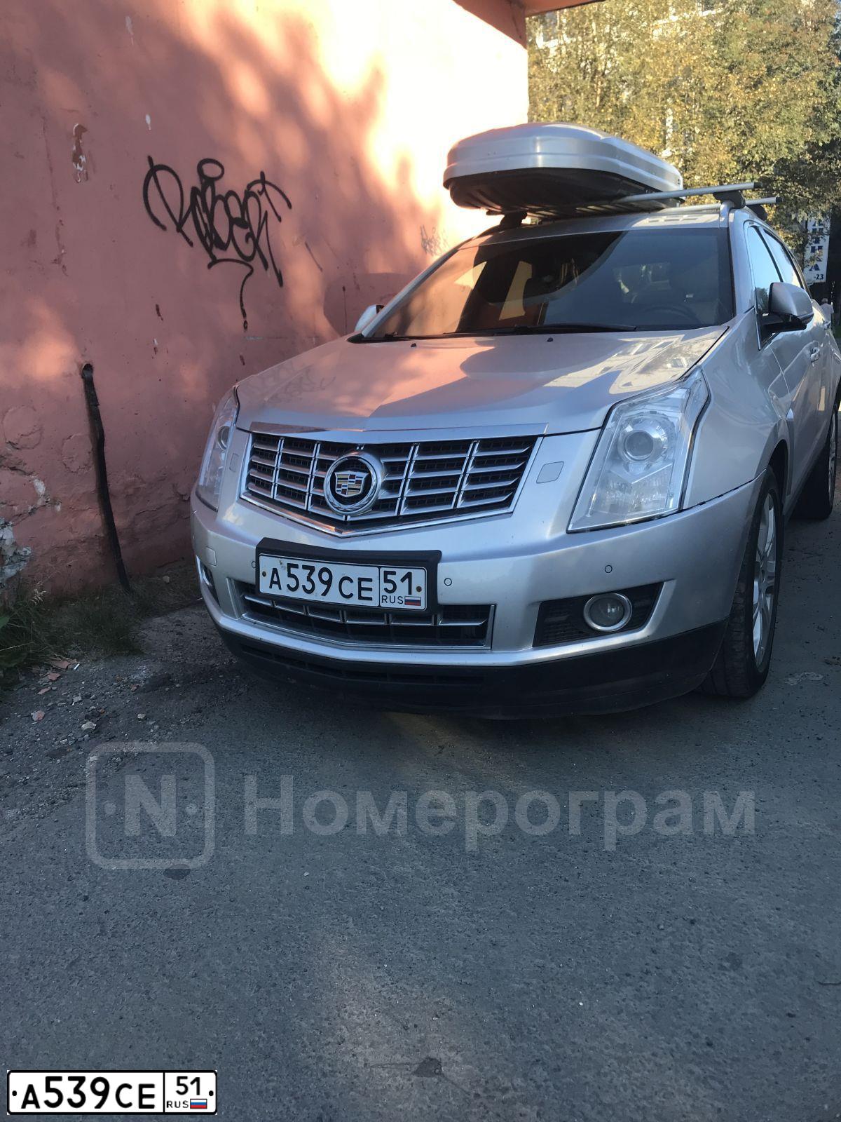Фото автомобиля CADILLAC SRX, 2014 — госномер А539СЕ51. Цвет: Серебристый