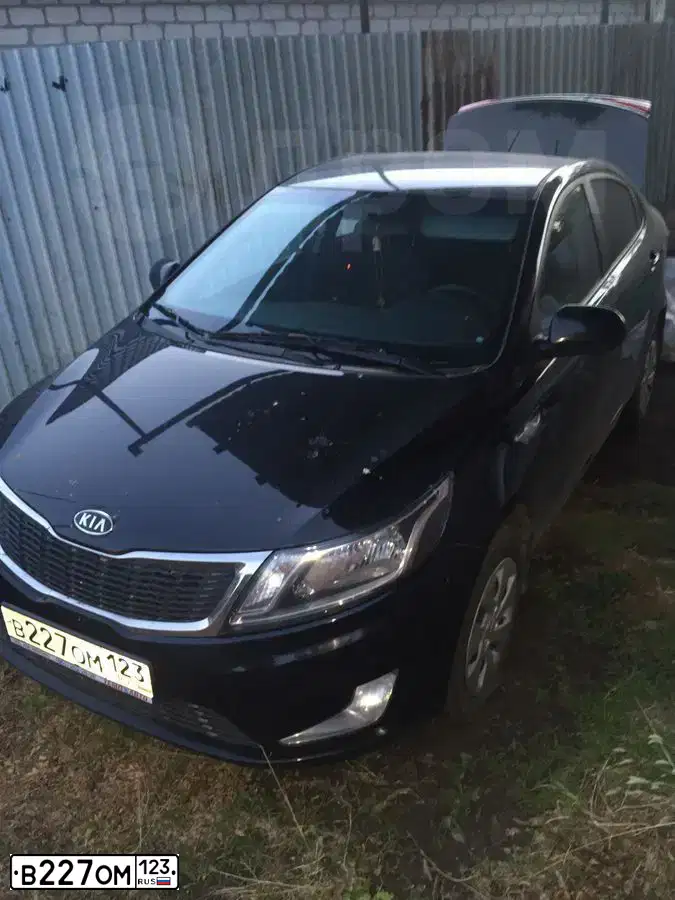 Фото автомобиля KIA RIO, 2012 — госномер В227ОМ123. Цвет: ЧЕРНЫЙ