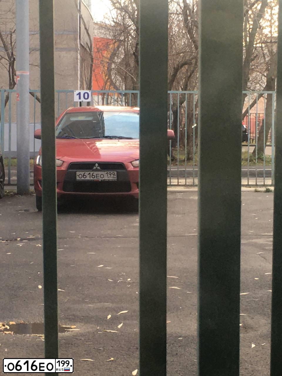 Фото автомобиля MITSUBISHI LANCER, 2008 — госномер О616ЕО199. Цвет: КРАСНЫЙ