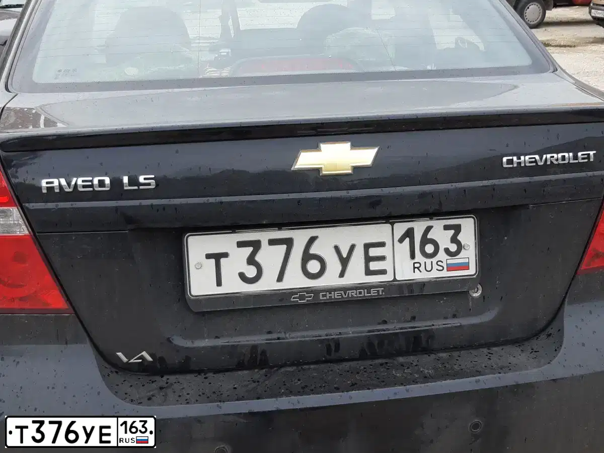 Фото автомобиля CHEVROLET AVEO, 2010 — госномер О914ОО62. Цвет: ЧЕРНЫЙ
