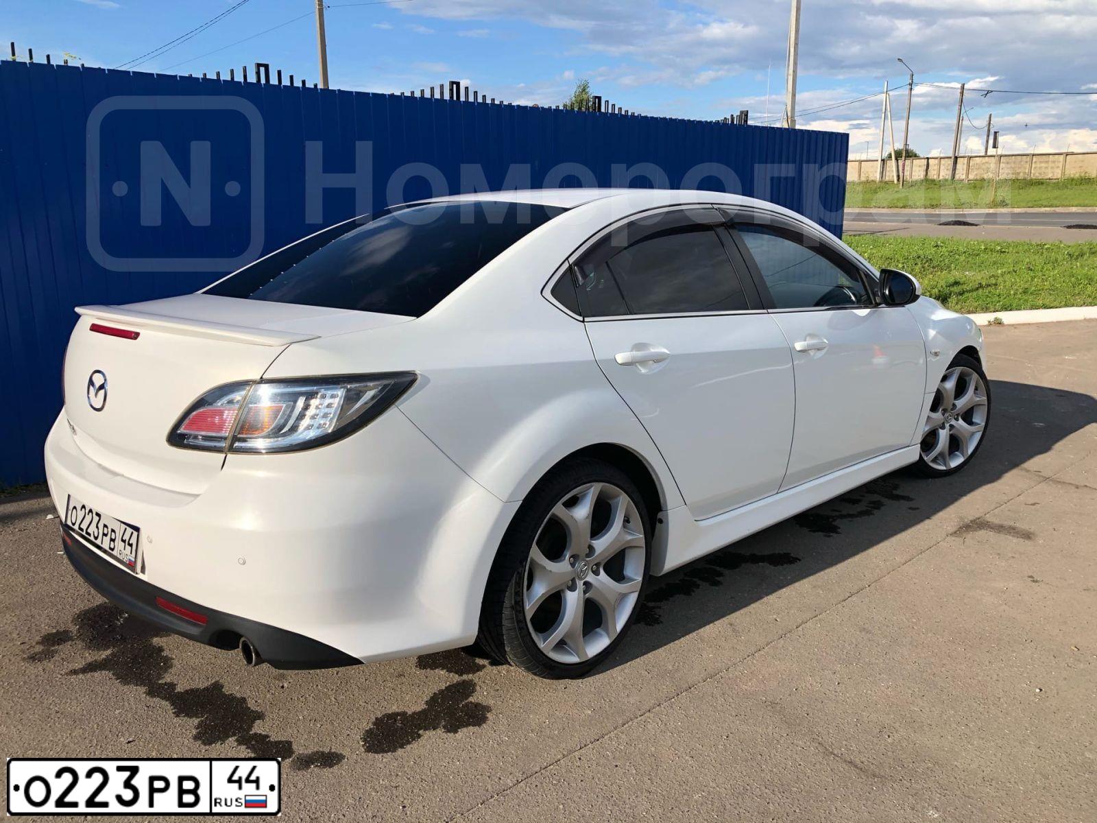 Фото автомобиля MAZDA 6, 2008 — госномер О223РВ44. Цвет: Белый