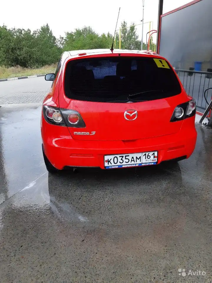 Фото автомобиля MAZDA A 3, 2007 — госномер К035АМ161. Цвет: Красный