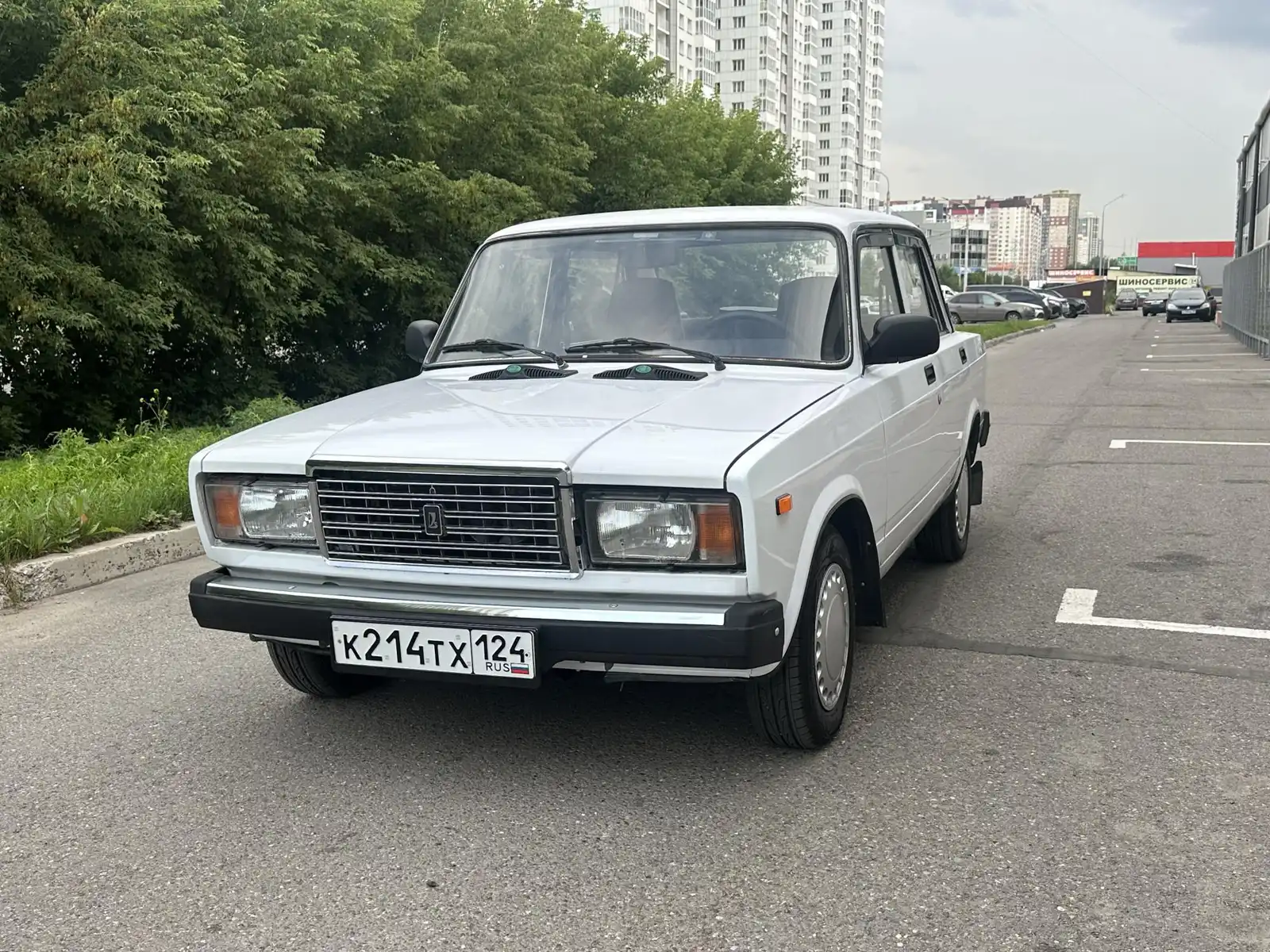Фото автомобиля LADA 2107, 2009 — госномер Р276НЕ75. Цвет: ЯРКО-БЕЛЫЙ