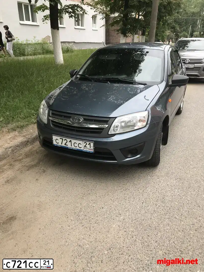 Фото автомобиля LADA 2190 GRANTA, 2012 — госномер М971ХТ21. Цвет: СЕРЕБРИСТЫЙ