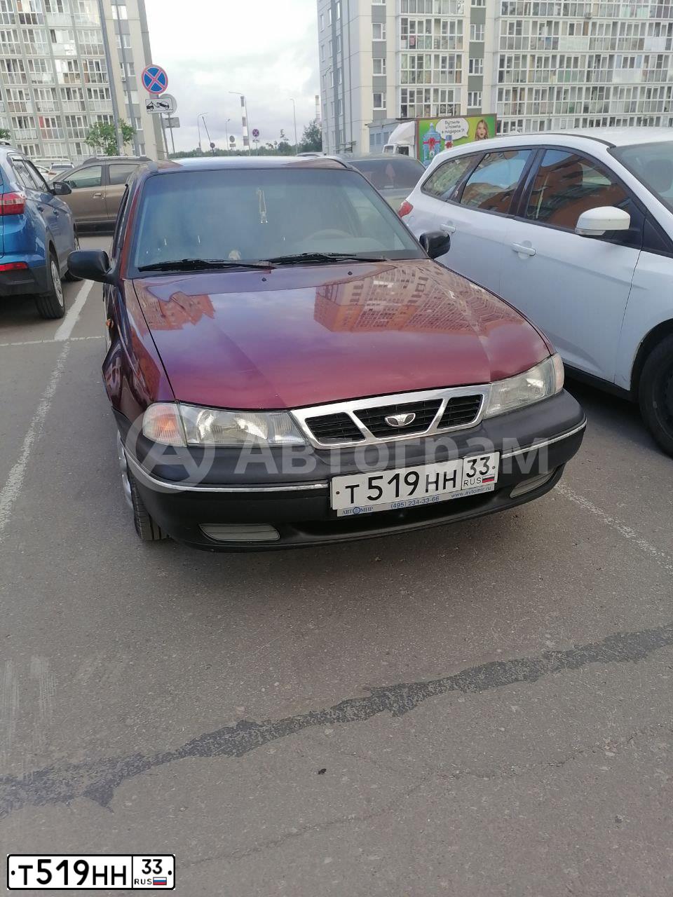 Фото автомобиля DAEWOO NEXIA, 2006 — госномер Т519НН33. Цвет: КРАСНЫЙ(СПЕЛАЯ ВИШНЯ)