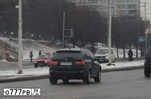 Фото автомобиля BMW X5, 2008 — госномер О202ОС39. Цвет: ЧЕРНЫЙ