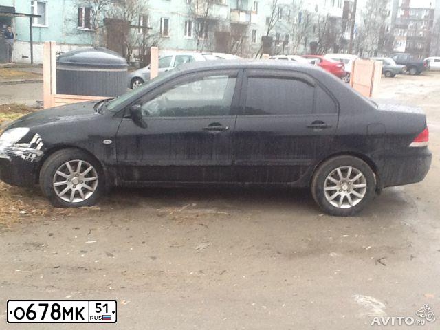 Фото автомобиля MITSUBISHI LANCER, 2006 — госномер У594ХЕ161. Цвет: ЧЕРНЫЙ