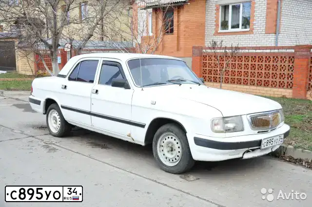 Фото автомобиля GAZ 3110 WOLGA, 2000 — госномер С895УО34. Цвет: Белый