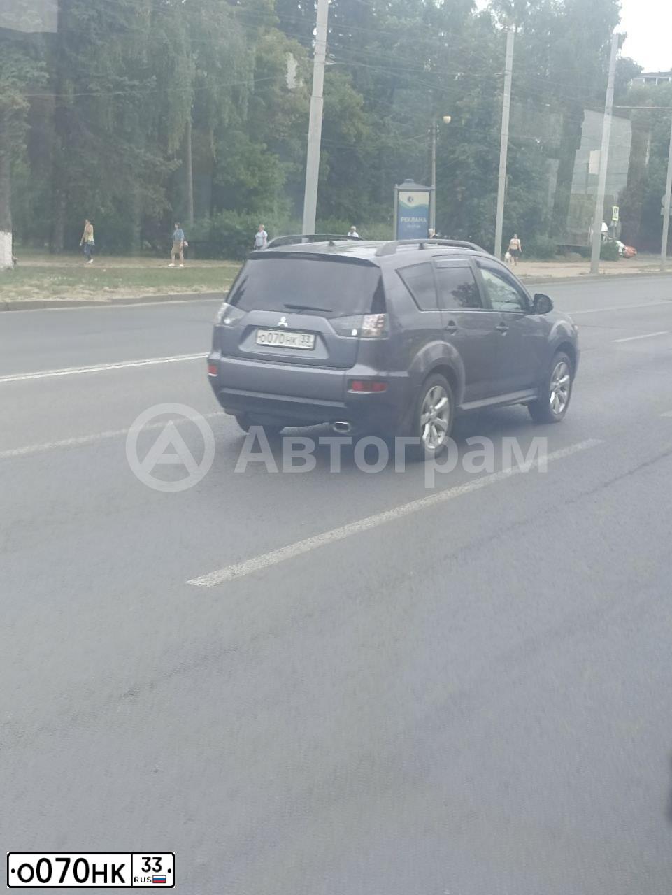 Фото автомобиля MITSUBISHI OUTLANDER, 2011 — госномер О070НК33. Цвет: СЕРЫЙ