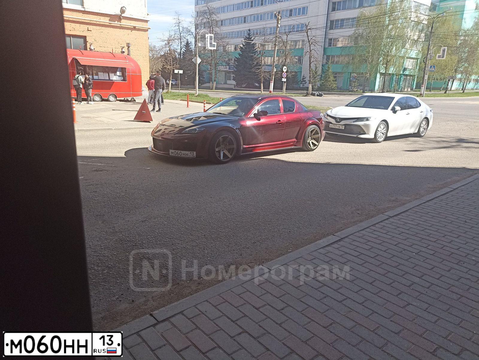 Фото автомобиля LADA 2172 PRIORA, 2009 — госномер М060НН13. Цвет: Темно-зеленый