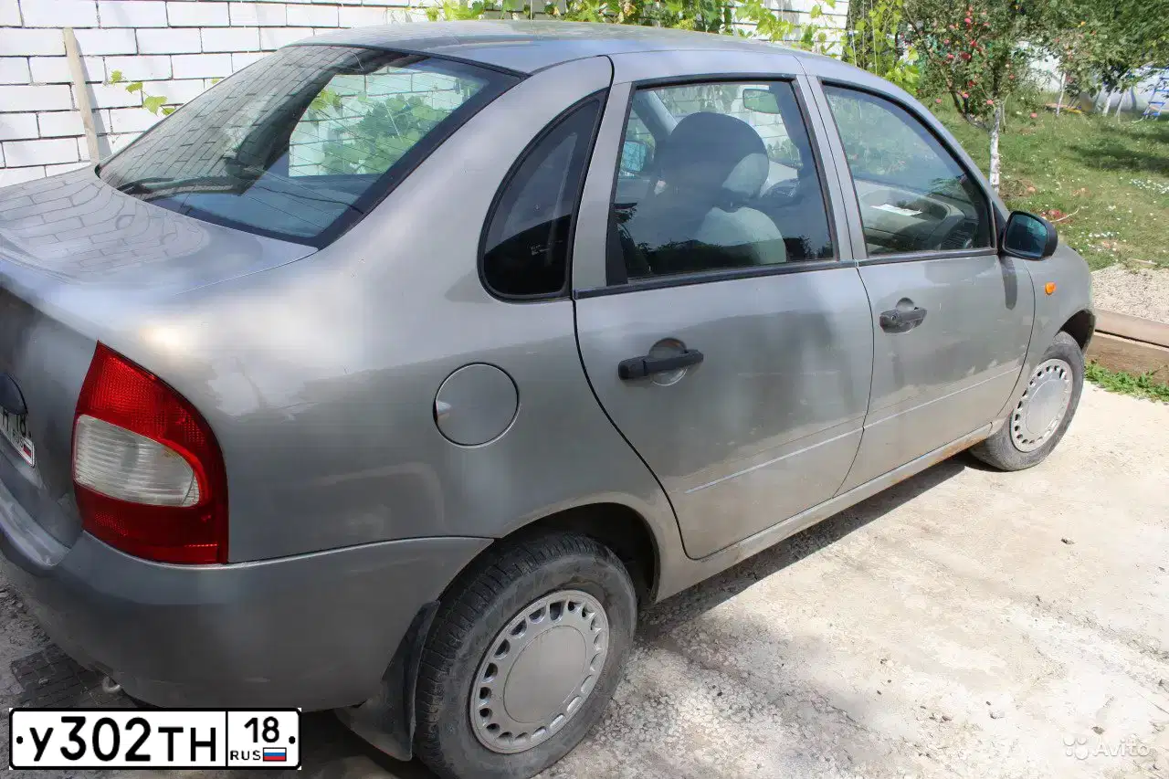 Фото автомобиля LADA KALINA, 2005 — госномер А602ТА790. Цвет: БЕЖЕВО-СЕРЫЙ