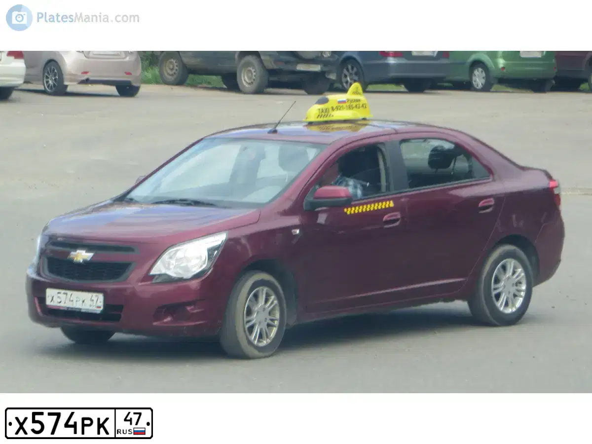 Фото автомобиля CHEVROLET COBALT, 2013 — госномер Х574РК47. Цвет: ТЕМНО-КРАСНЫЙ